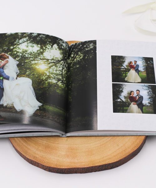 Wedding album open showing wedding pictures
